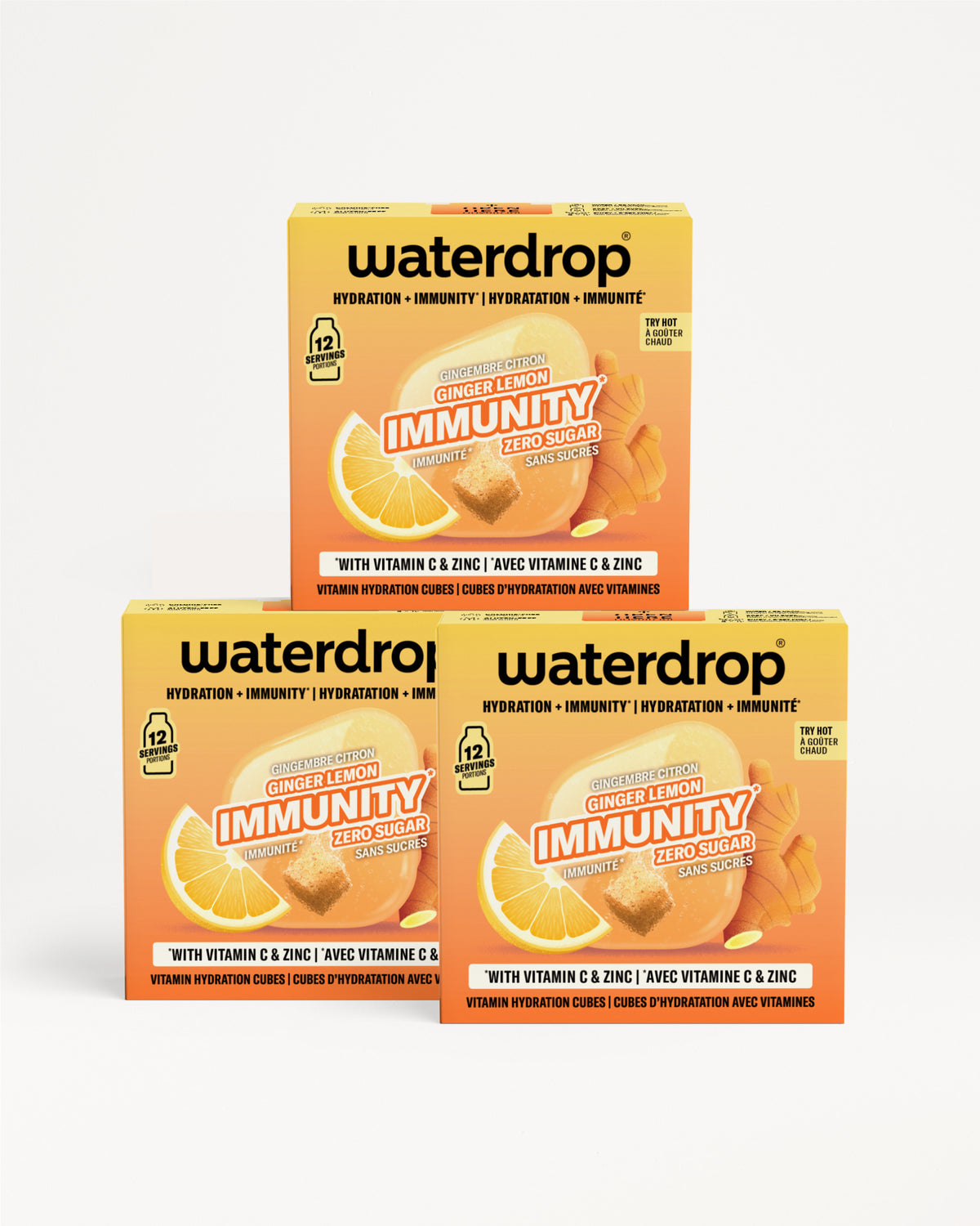 Tres cajas naranja de Waterdrop Immunity con vitamina C y zinc, apiladas en forma de pirámide.
