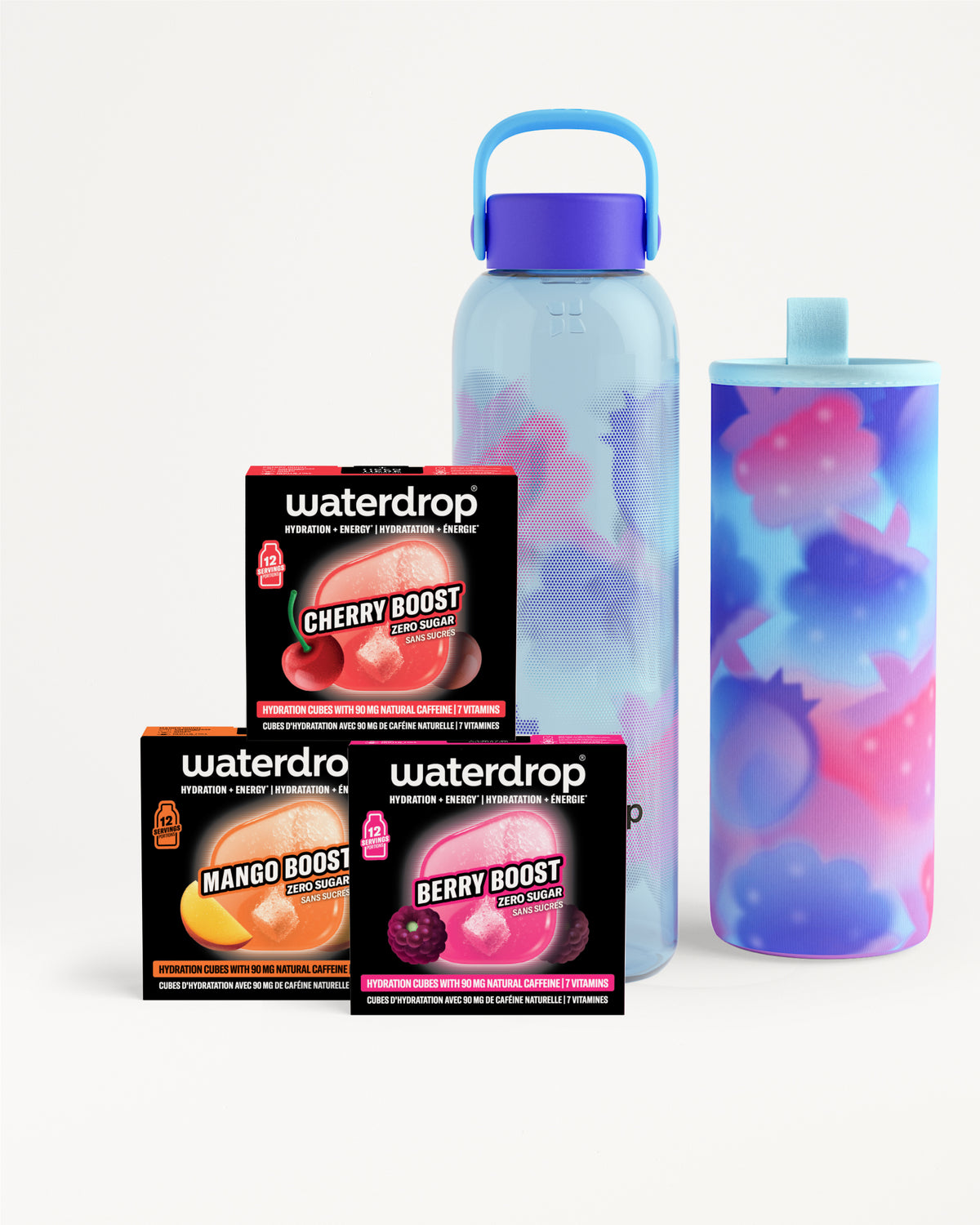 Tres cajas de sabor junto a una botella reutilizable azul claro y un vaso a juego.