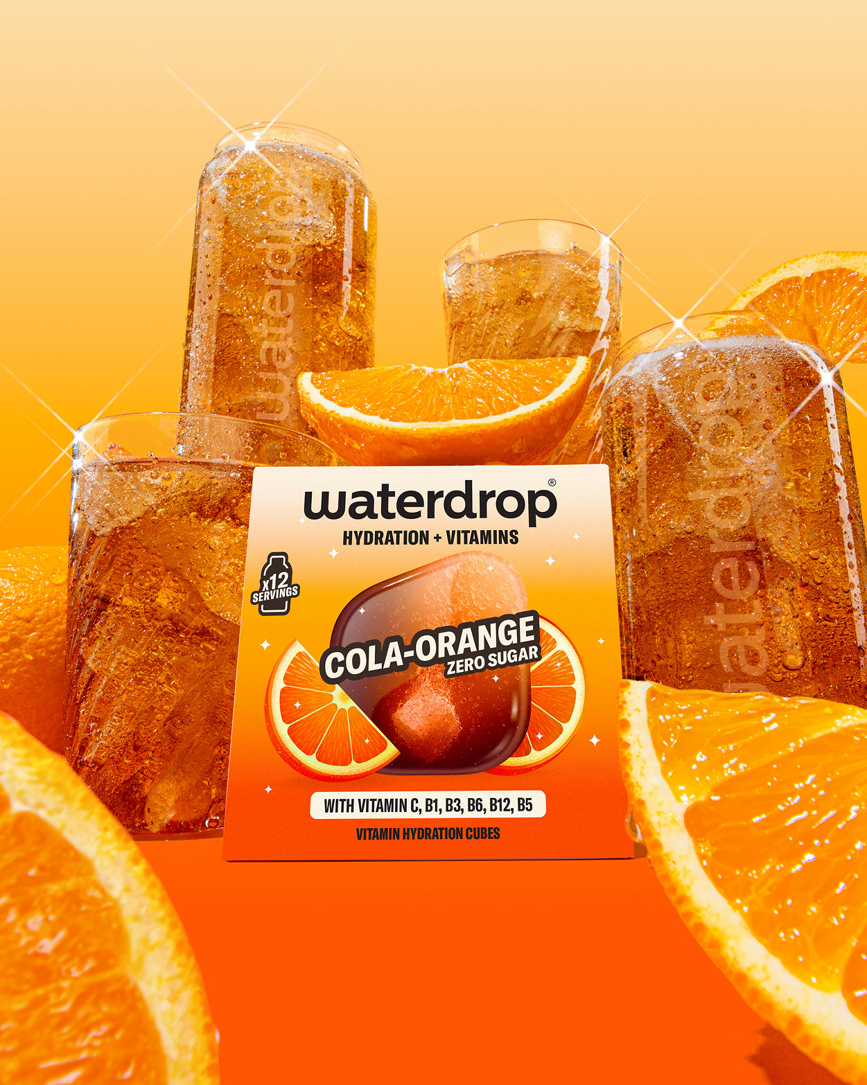 COLA ORANGE hydration cubes with vitamins, ice drinks, and orange slices.