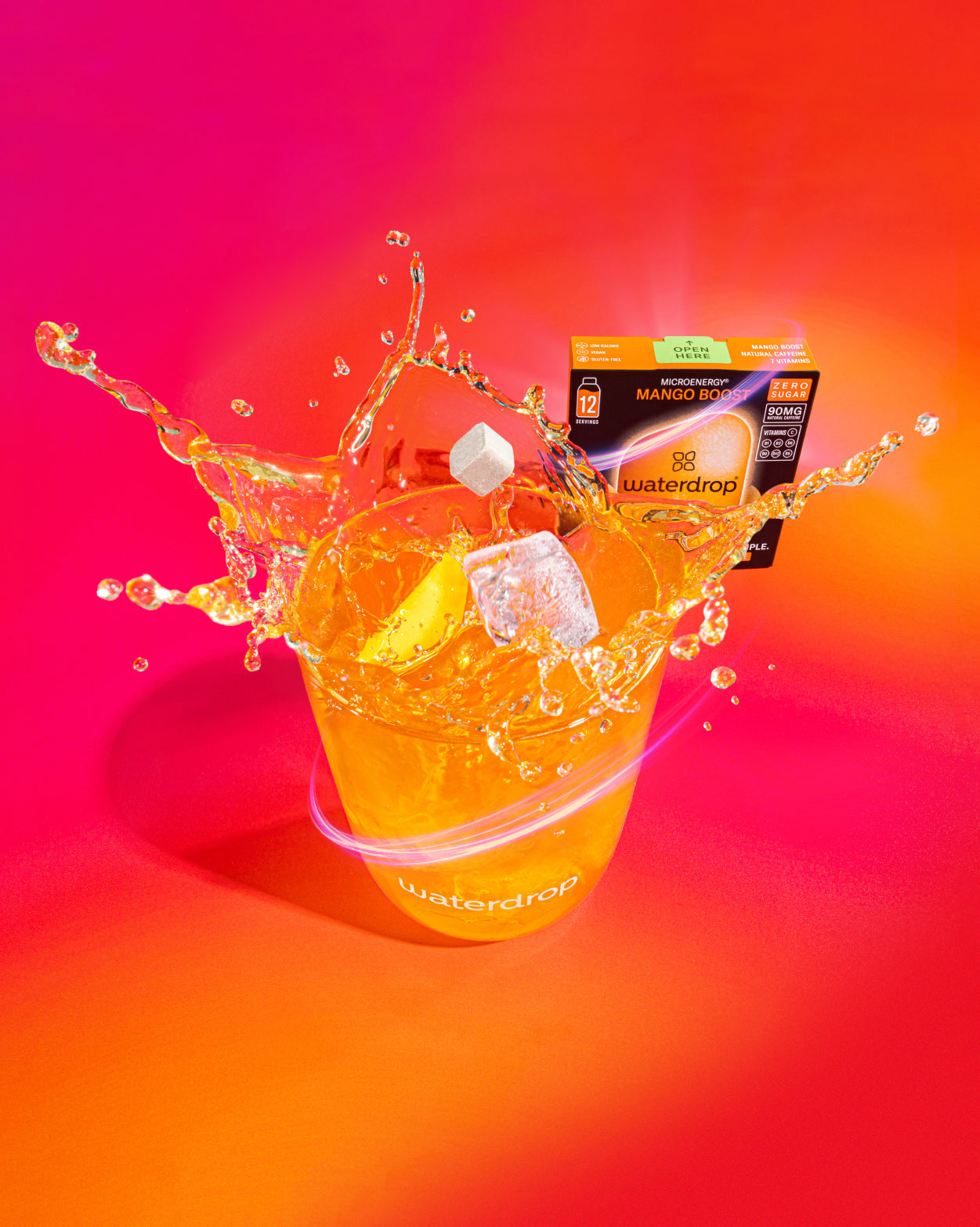 Microenergy 3+1 Mango Boost with splash and dissolving cube.