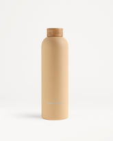 Botella de acero · Tapón de bambú