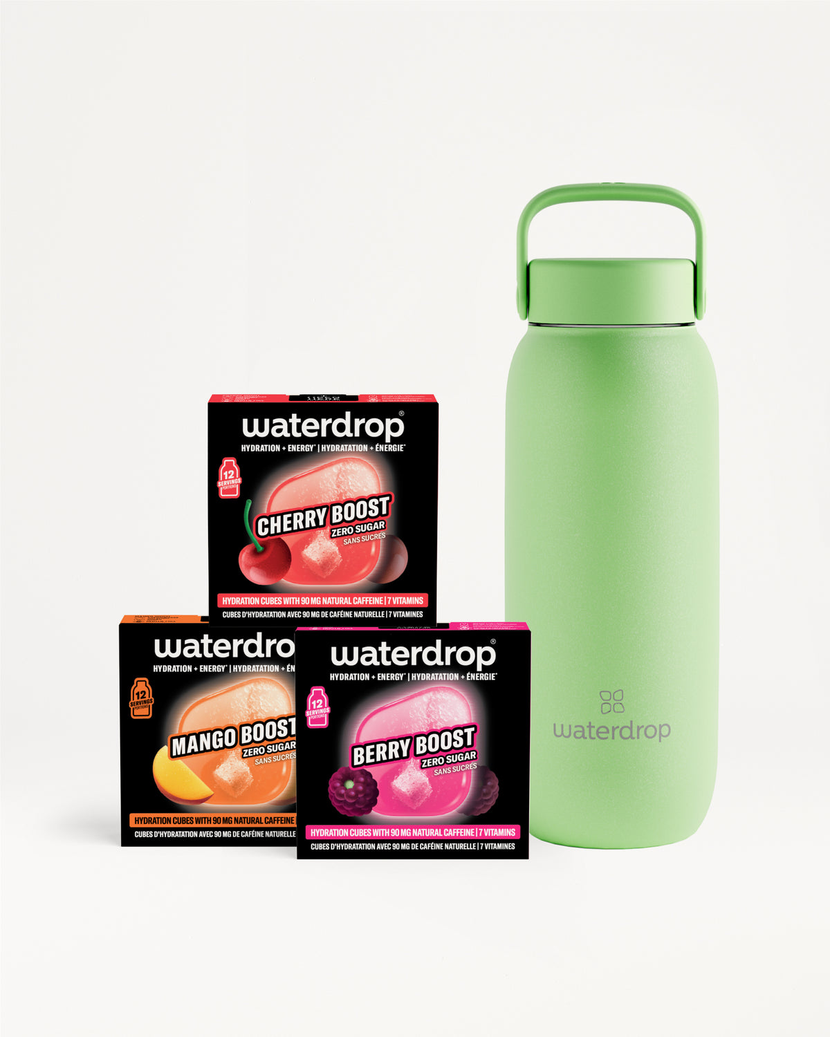 Botella verde aislante con asa junto a tres cajas de sabores Waterdrop.