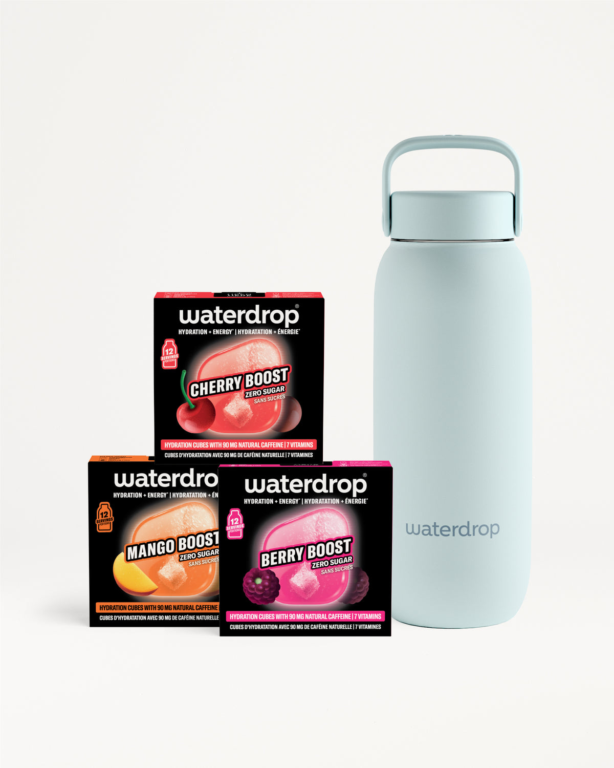 Tres cajas de sobres con sabor junto a una botella reutilizable azul claro.