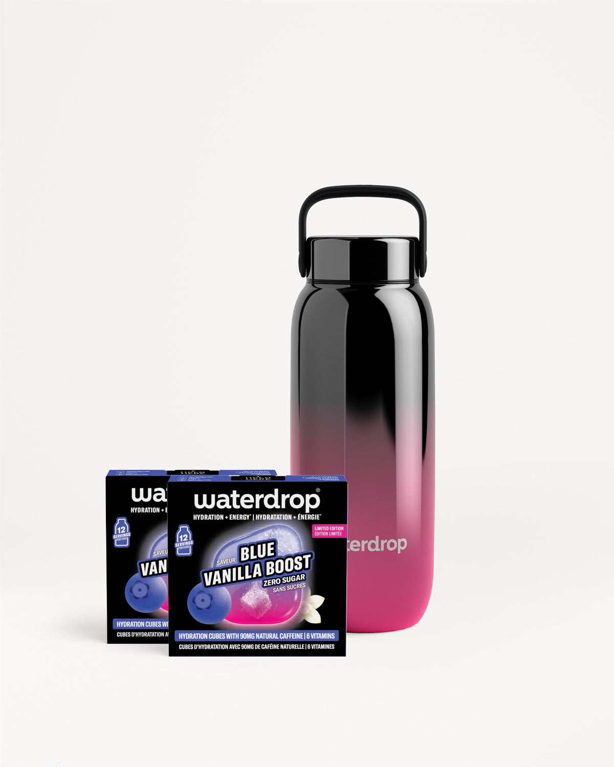 Botella reutilizable con degradado negro a rosa con asa, junto a una caja de producto Waterdrop.