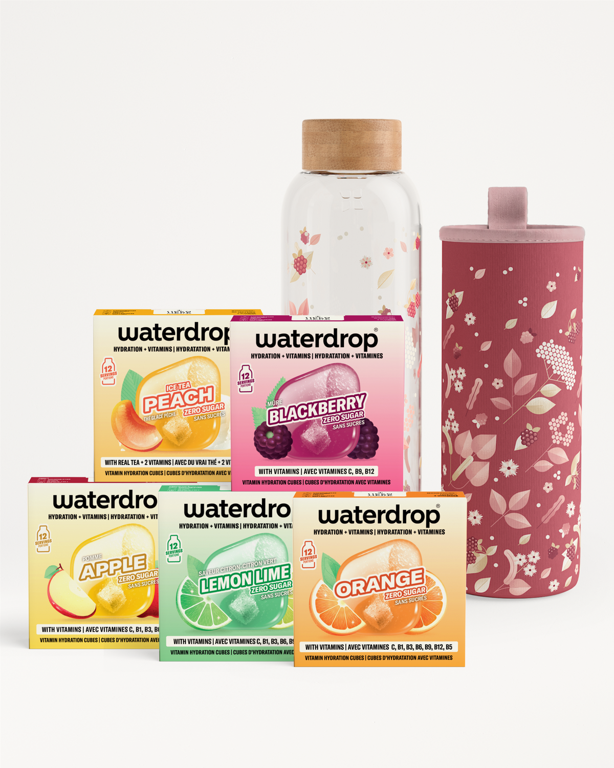 Surtido de cajas de sabor Waterdrop, una botella transparente con tapón de corcho y una taza térmica rosa con diseño floral.