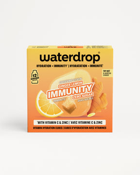 Caja naranja de Waterdrop para la inmunidad con imagen de limón y jengibre.