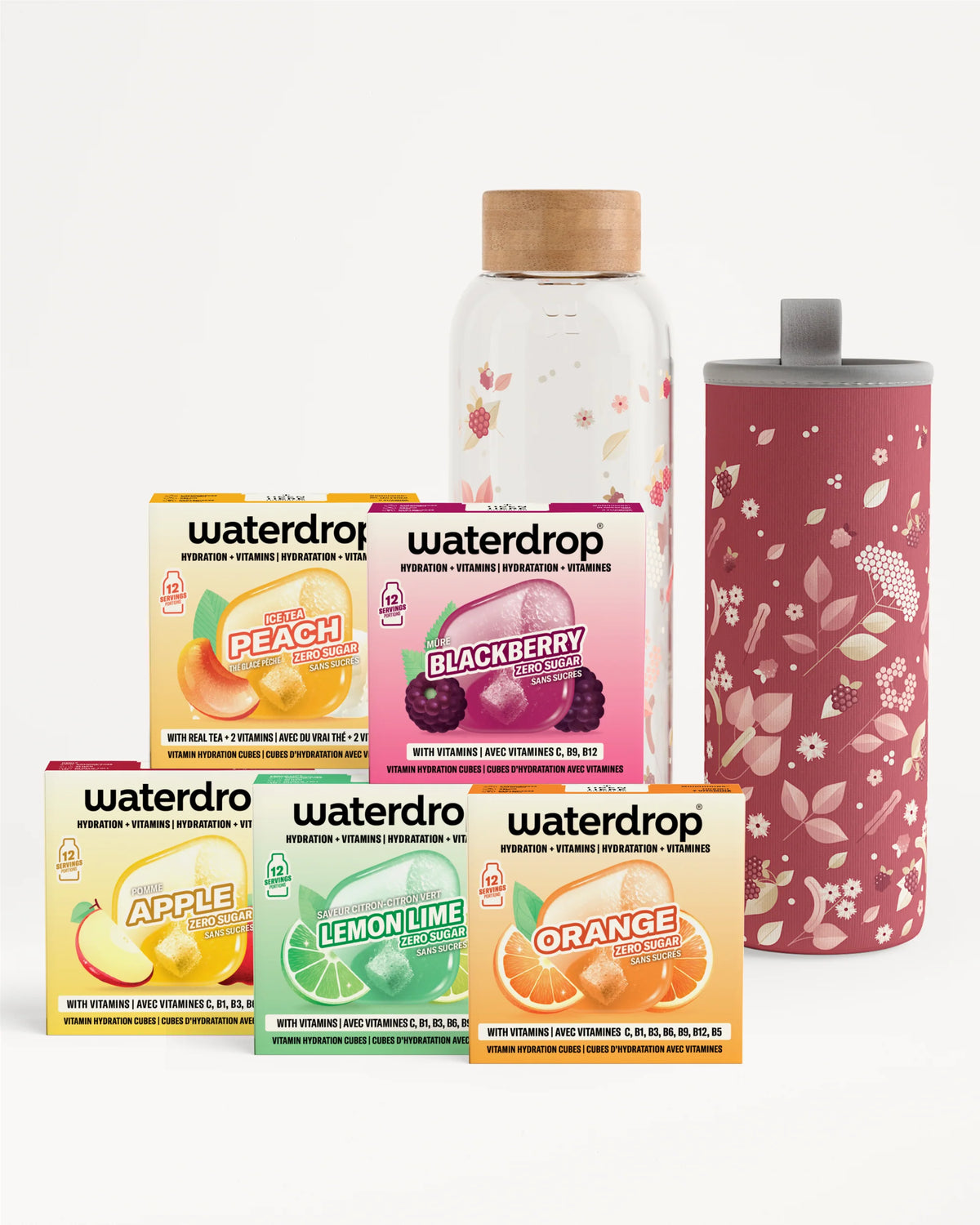 Conjunto de cajas de sabores Waterdrop, una botella transparente con tapa de madera y una taza alta con diseño floral.