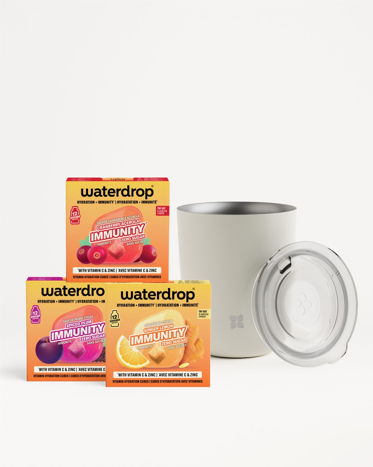 Tres cajas de Waterdrop Immunity con una taza blanca y tapa transparente sobre un fondo claro.