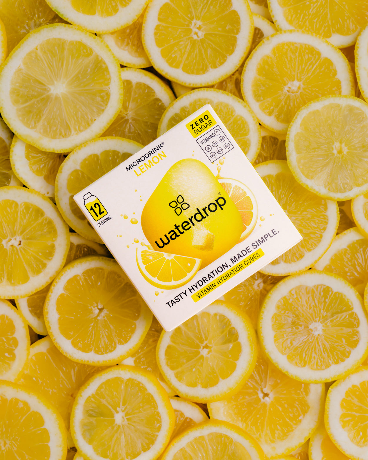 LEMON 3+1 hydration cubes on lemon slice bed.